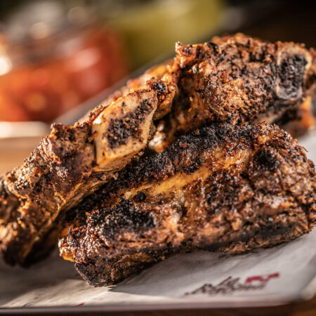 Costillas photo of 3 bbq ribs