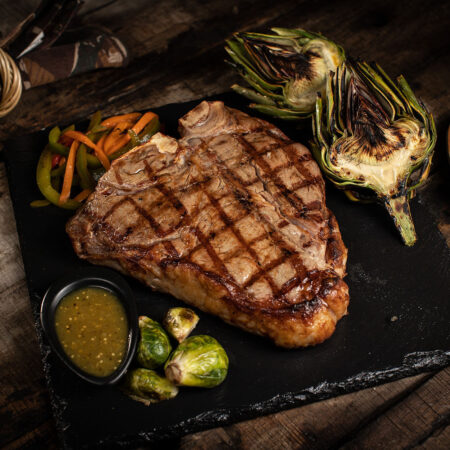 Porter House photo of a 2" porter house perfectly grilled